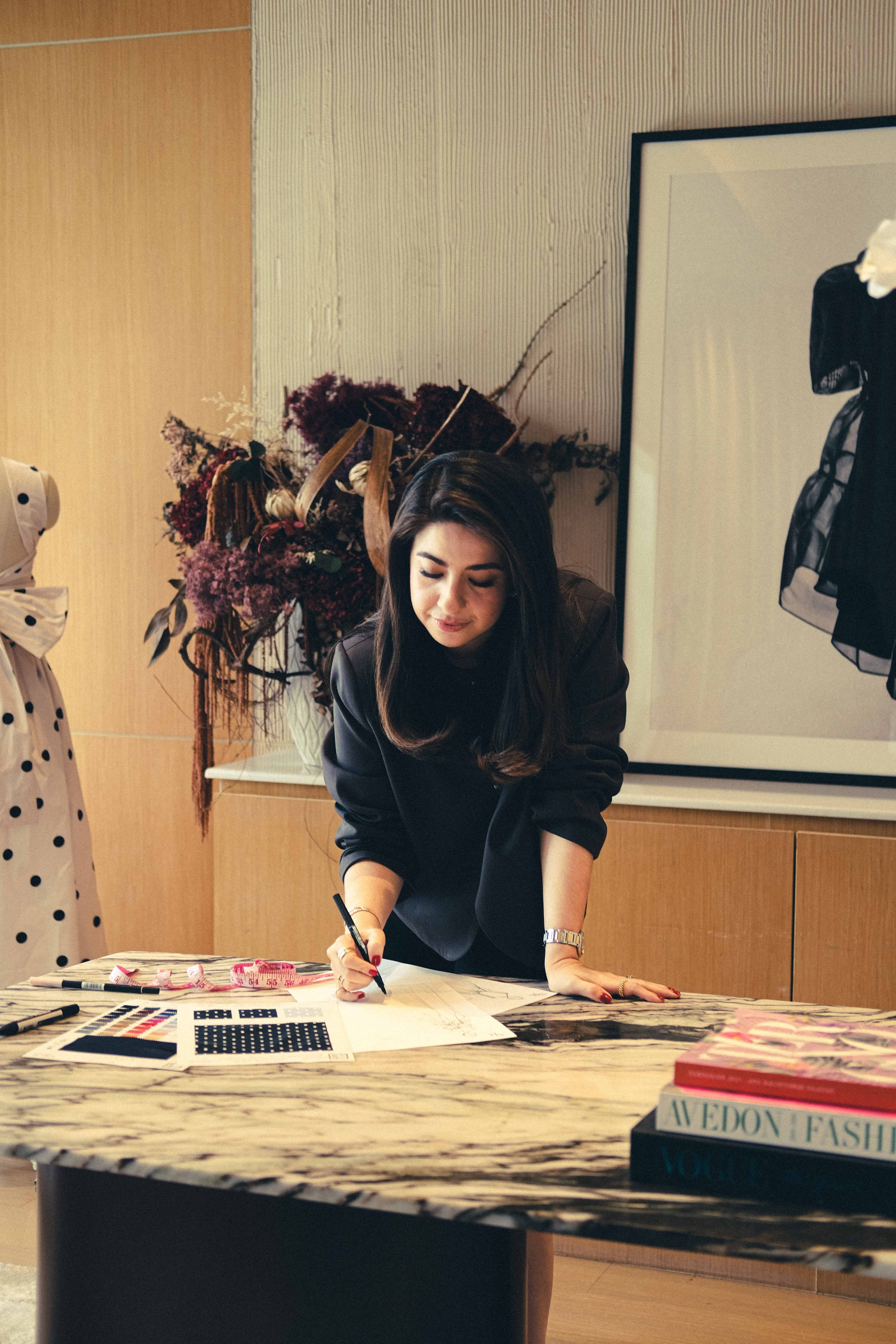 Vania and Mark working in their respective ateliers. PHOTOS: COURTESY OF PLAINS AND PRINTS